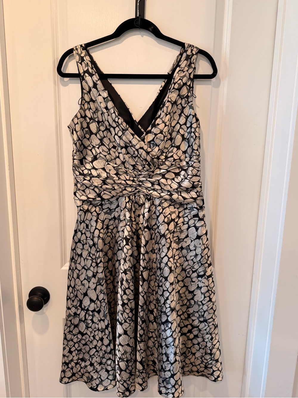 Black and ivory sleeveless fit-and-flare dress with an abstract pebble print. - Picture 4 of 5